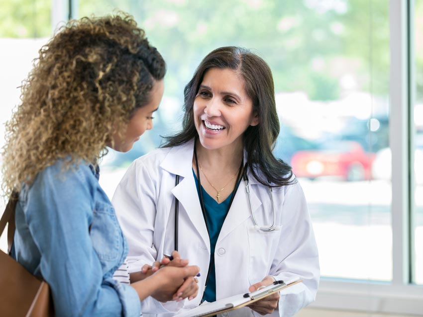 doctor talking to patient