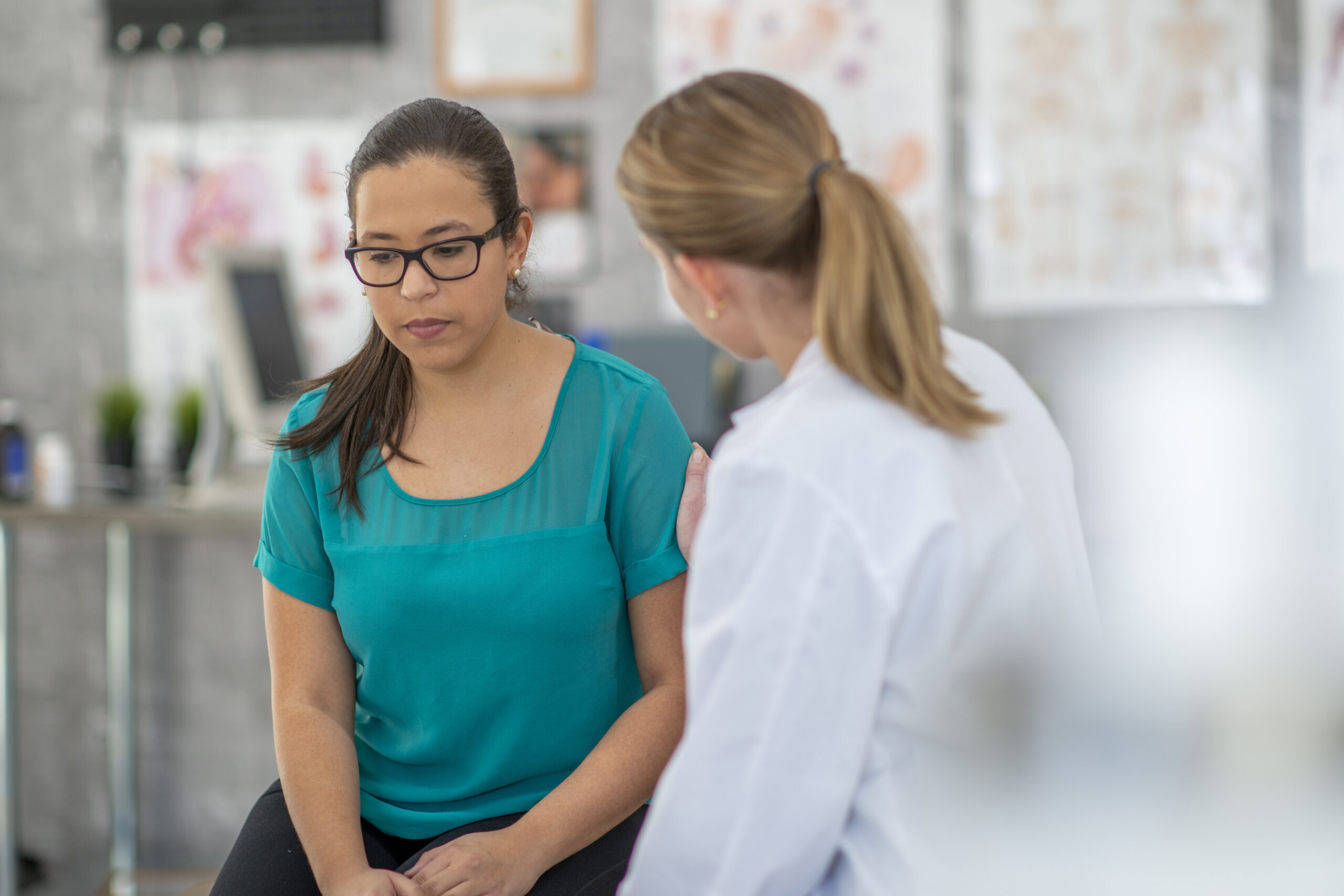 Nervous woman at doctor's clinic